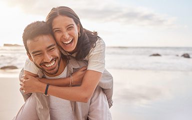 Shot-of-a-couple-enjoying-a-day-at-the-beach